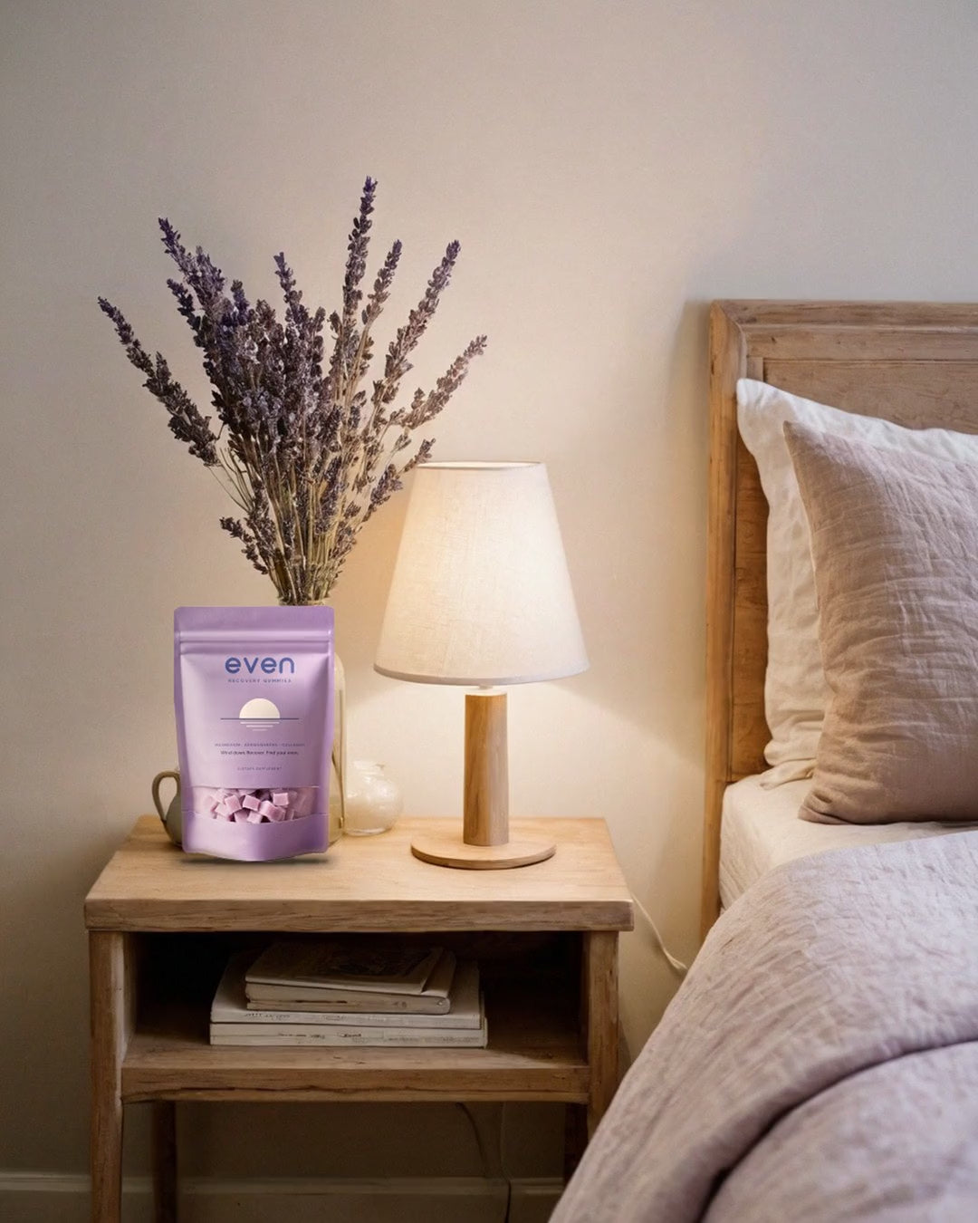 even Recovery Gummies pouch on a bedside table at night